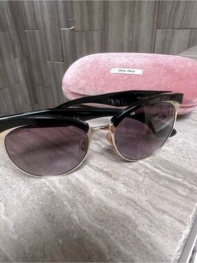 Miu Miu Black and Gold Cat-Eye Sunglasses with Pink Case